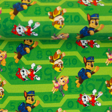Baumwolljersey Paw Patrol - springende Hunde auf grün